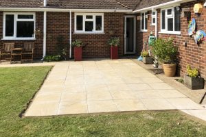 Newly laid paving stone patio at the rear of a private house.