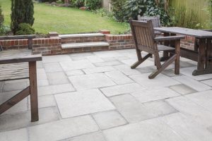 New flagstone patio and backyard, outdoor garden patio with furniture, UK