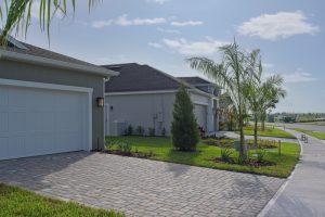 Recently completed Florida new home construction with driveway pavers.