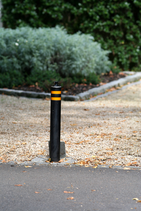 Security barrier post in drive